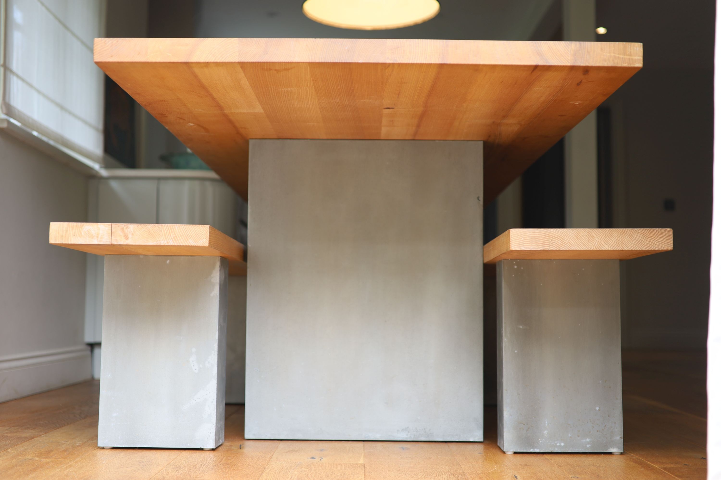 A contemporary oak kitchen table with pair of matching benches and oxidised metal supports, table width 230cm depth 90cm height 74cm, benches width 180cm